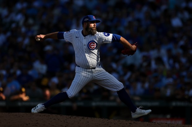 Cubs relief pitcher Andrew Kittredge delivers during the eighth inning...