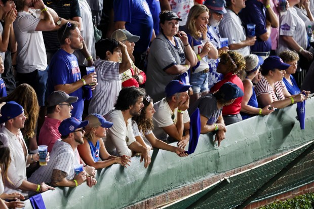 Nervous Cubs watch after San Diego Padres outfielder Jackson Merrill...