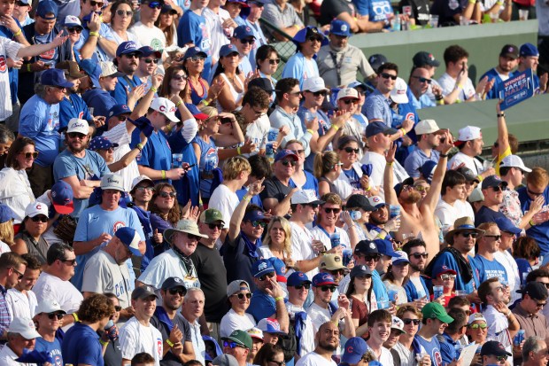 Fans cheer after the Cubs scored during the second inning of Game 3 of the National League wild-card series against the San Diego Padres at Wrigley Field on Oct. 2, 2025. (Eileen T. Meslar/Chicago Tribune)