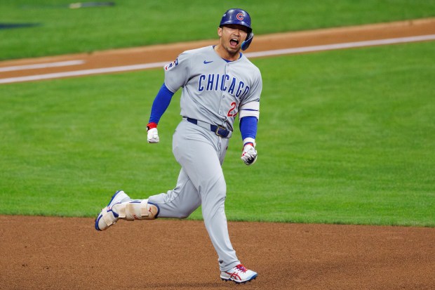 Chicago Cubs outfielder Seiya Suzuki (27) runs the bases after...