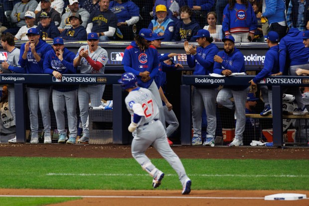 Chicago Cubs outfielder Seiya Suzuki (27) runs the bases after...