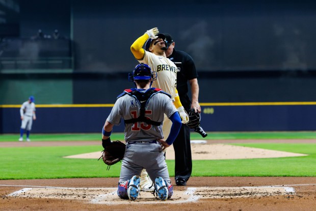 Milwaukee Brewers catcher William Contreras (24) crosses home plate after hitting a solo-homer during the first inning against the Chicago Cubs in Game 5 of the NL Division Series at American Family Field Saturday Oct. 11, 2025, in Milwaukee. (Armando L. Sanchez/Chicago Tribune)