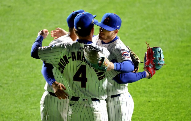 Chicago Cubs outfielders Seiya Suzuki, Pete Crow-Armstrong (4), and Ian...