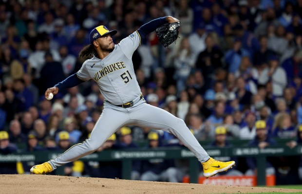 Brewers starting pitcher Freddy Peralta delivers to the Cubs in...
