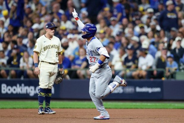 Chicago Cubs outfielder Seiya Suzuki (27) runs the bases after...
