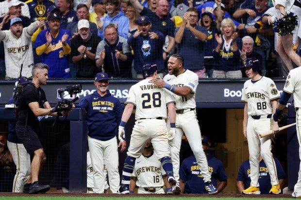 Milwaukee Brewers first baseman Andrew Vaughn (28) celebrates with Milwaukee...