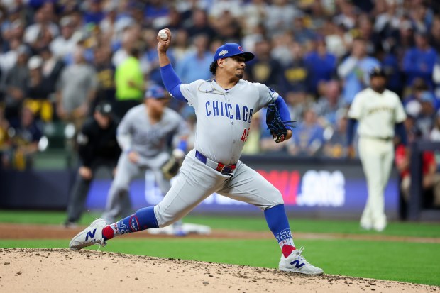 Chicago Cubs pitcher Daniel Palencia (48) pitches during the third...