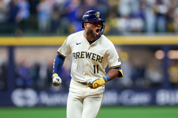 Milwaukee Brewers outfielder Jackson Chourio (11) runs the bases after...