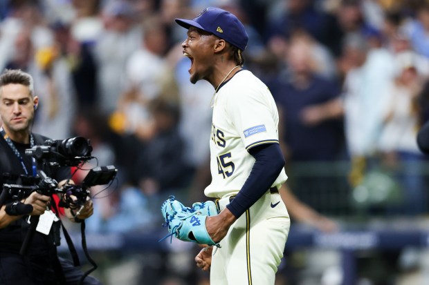 Milwaukee Brewers pitcher Abner Uribe (45) celebrates after the Brewers...