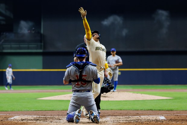 Milwaukee Brewers catcher William Contreras (24) crosses home plate after hitting a solo-homer during the third inning against the Chicago Cubs in Game 2 of the NL Division Series Monday Oct. 6, 2025, in Milwaukee. (Armando L. Sanchez/Chicago Tribune)