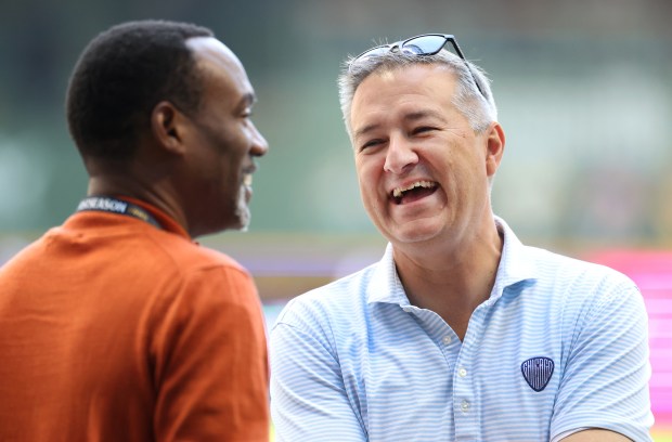 Chicago Cubs chairman Tom Ricketts has a laugh on the...