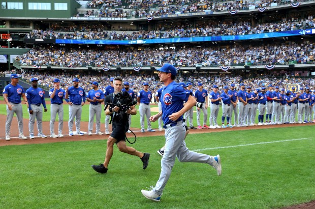 Chicago Cubs manager Craig Counsell (11) is introduced before the...