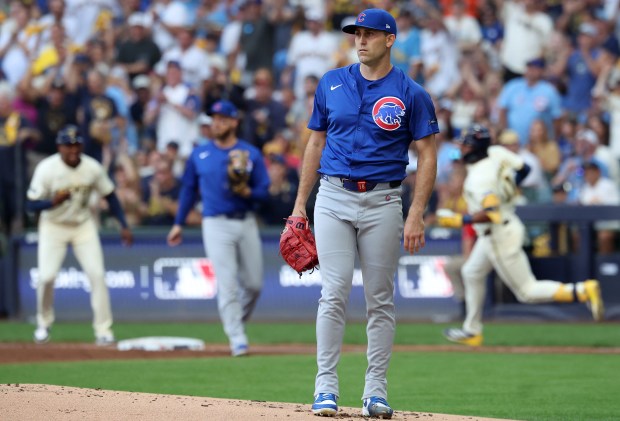 Cubs starter Matthew Boyd stands on the mound as Brewers...