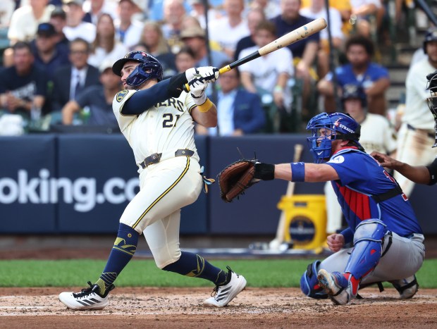 Milwaukee Brewers third baseman Caleb Durbin (21) drives in two...