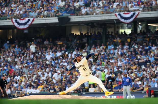 Milwaukee Brewers pitcher Freddy Peralta (51) delivers to the Chicago...
