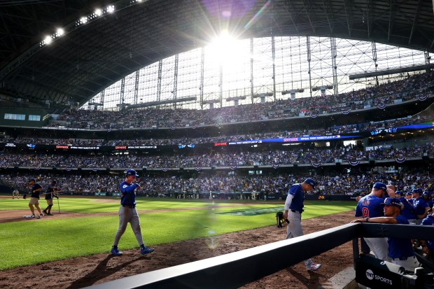 Chicago Cubs center fielder Pete Crow-Armstrong walks to the dugout...