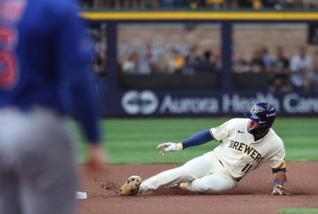 Milwaukee Brewers left fielder Jackson Chourio slide into second base with a double in the first inning of the NL Division Series Game 1 against the Chicago Cubs at American Family Field in Milwaukee on Oct. 4, 2025. (Chris Sweda/Chicago Tribune)