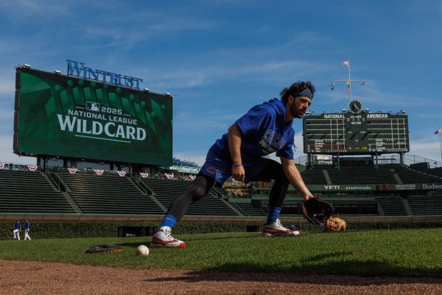Cubs shortstop Dansby Swanson warms up before wild-card Game 2 against the Padres at Wrigley Field, Oct. 1, 2025. (Armando L. Sanchez/Chicago Tribune)