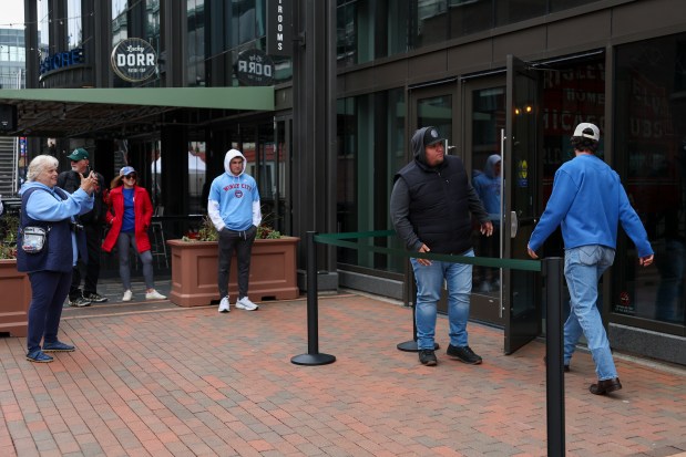 Sam Bernero photographs Chicago Cubs shortstop Dansby Swanson arriving outside of Wrigley Field on Wednesday, May 28, 2025. (Eileen T. Meslar/Chicago Tribune)