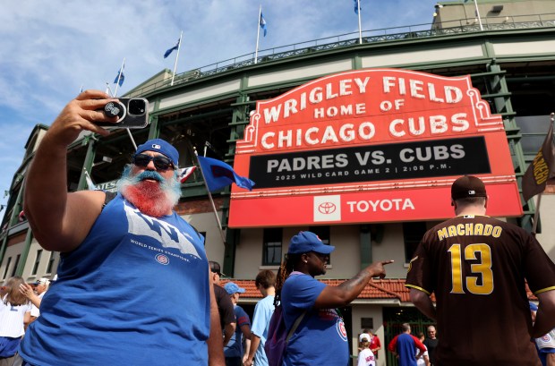 Paul Margolis, of Palatine, takes a selfie outside of Wrigley Field before Game 2 of the NL wild-card series between the Cubs and the San Diego Padres on Oct. 1, 2025. (Chris Sweda/Chicago Tribune)