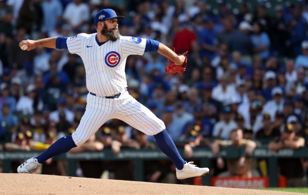 Chicago Cubs starting pitcher Andrew Kittredge delivers to the San...