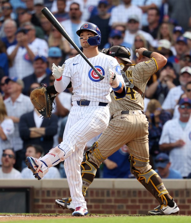 Chicago Cubs right fielder Seiya Suzuki strikes out in the...
