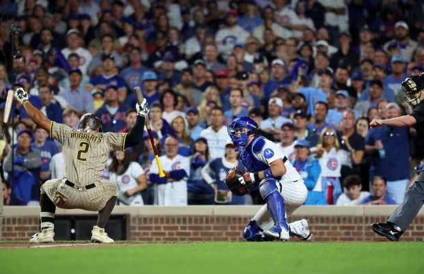 Padres shortstop Xander Bogaerts (2) reacts as he is called...
