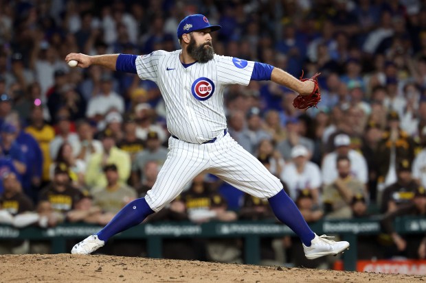 Cubs relief pitcher Andrew Kittredge delivers to the San Diego...