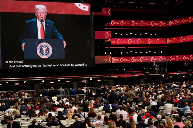 President Donald Trump speaks at a memorial for conservative activist Charlie Kirk, Sunday, Sept. 21, 2025, at State Farm Stadium in Glendale, Ariz. (AP Photo/Julia Demaree Nikhinson)