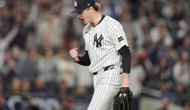New York Yankees pitcher Cam Schlittler pumps his fist as he walks off the field.