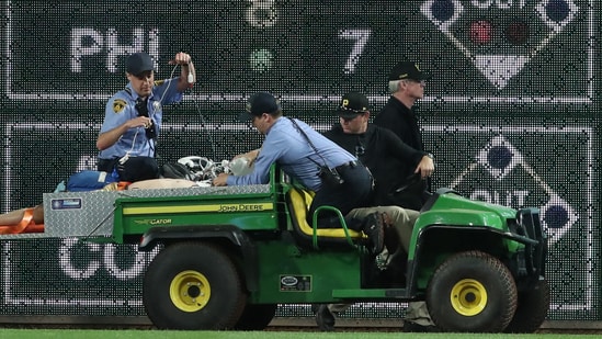 Stadium security and Pittsburgh Pirates medical personnel cart Kavan Markwood after the tragic fall over the Clemente Wall(IMAGN IMAGES via Reuters Connect)