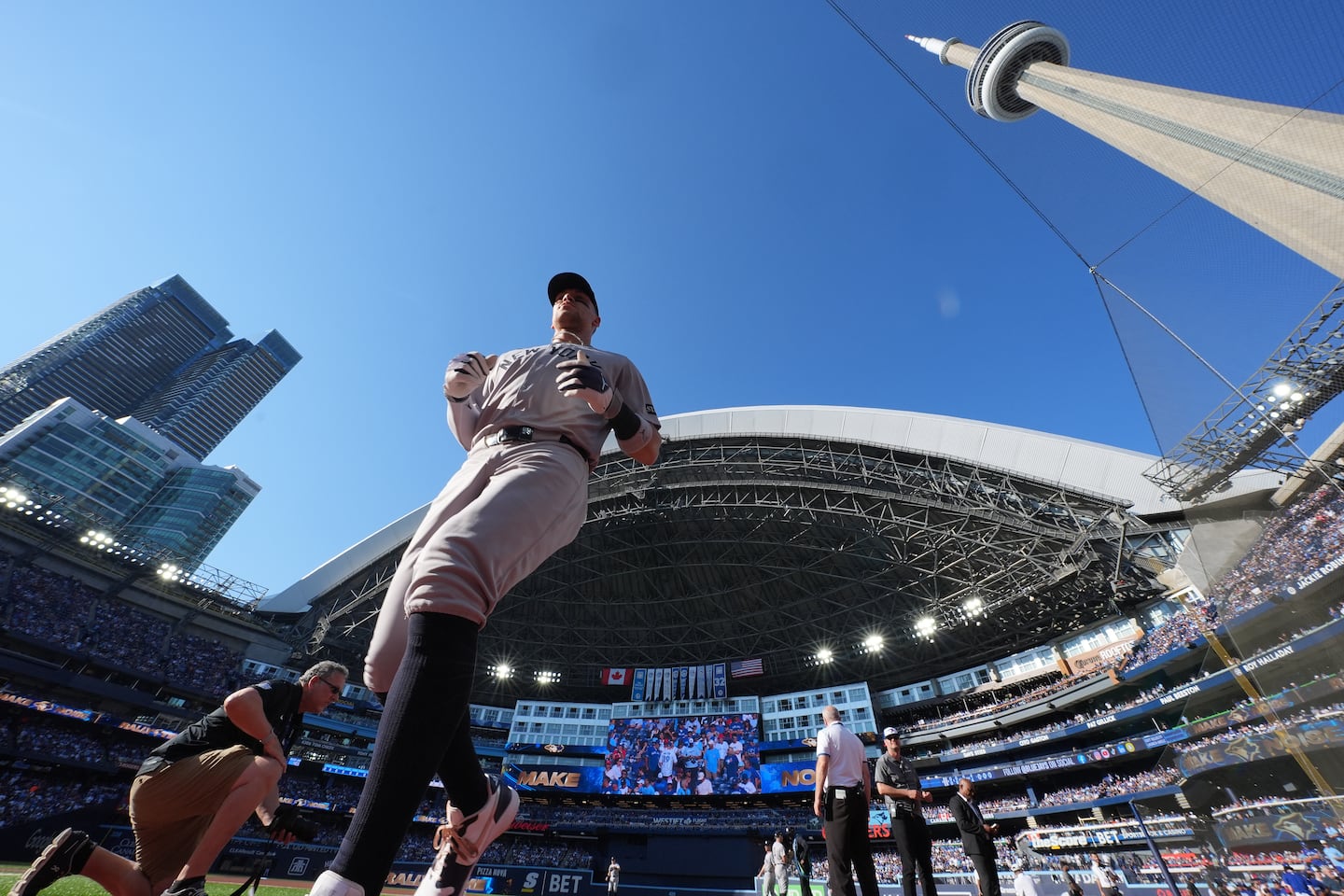 New York Yankees outfielder Aaron Judge headed to the dugout before Game 2 of the American League Division Series against the Toronto Blue Jays in Toronto on Sunday.
