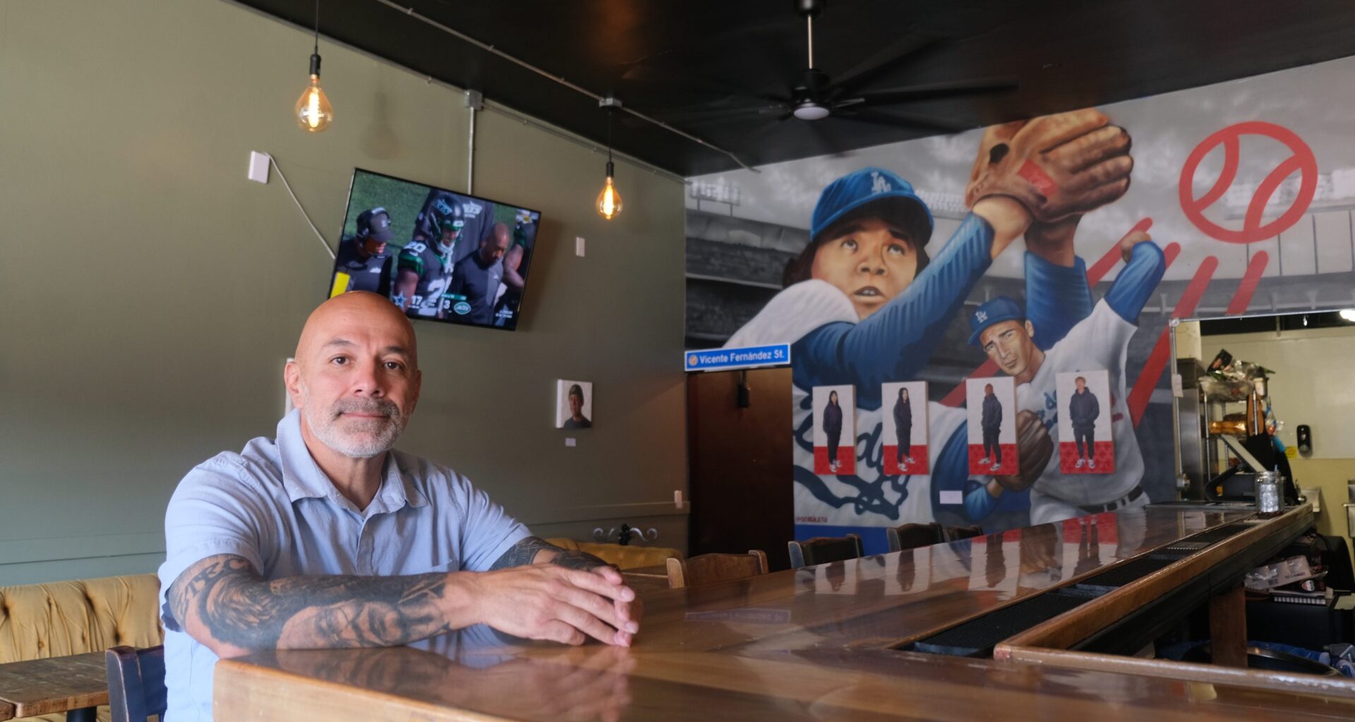 Why this LA business owner is painting over his Dodgers mural