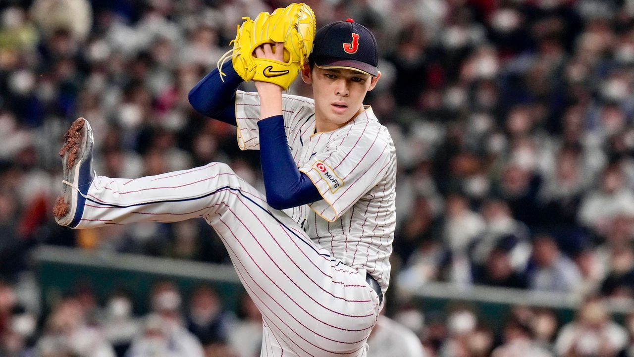 Roki Sasaki, of Japan pitches, during their Pool B game against the Czech Republic at the World Baseball Classic at the Tokyo Dome, Japan, Saturday, March 11, 2023. (AP Photo/Eugene Hoshiko, File)