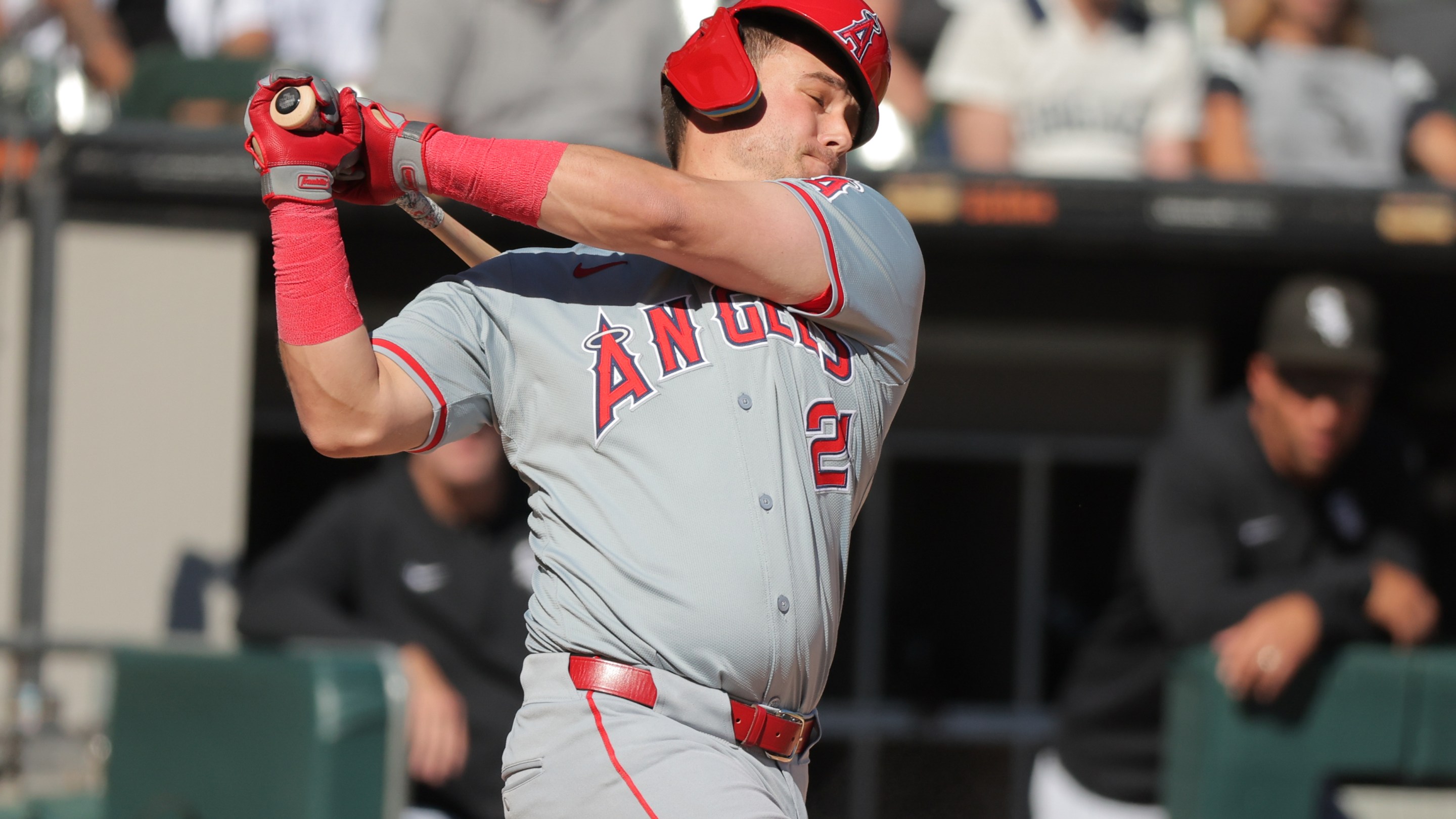 Matt Thaiss of the Los Angeles Angels strikes out swinging during the fifth inning against the Chicago White Sox on September 26,2024. His helmet's all wonky on his head.