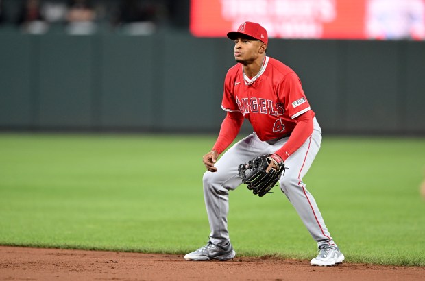 Angels second baseman Christian Moore stays ready in the field...
