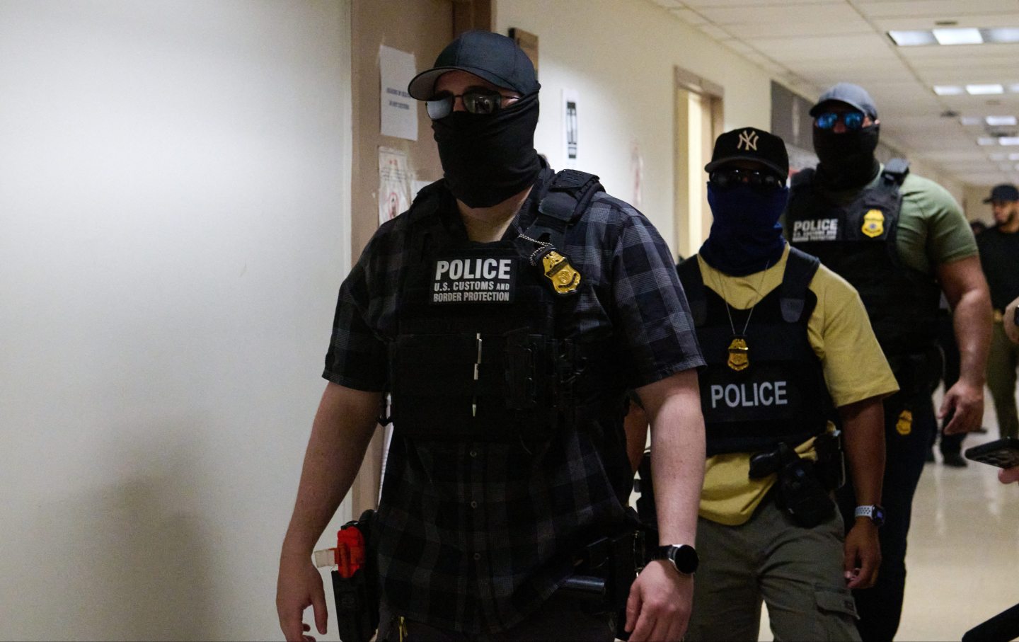 US federal agents working for Immigration and Customs Enforcement (ICE) detain immigrants and asylum seekers reporting for immigration court proceedings at the Jacob K. Javits Federal Building’s US Immigration Court in New York, New York, Thursday, July 24, 2025.