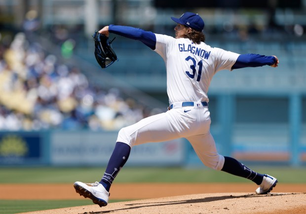 Tyler Glasnow of the Dodgers pitches during the first inning...