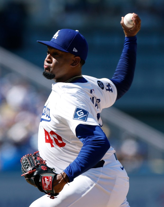 Alexis Díaz of the Dodgers pitches in relief during the...