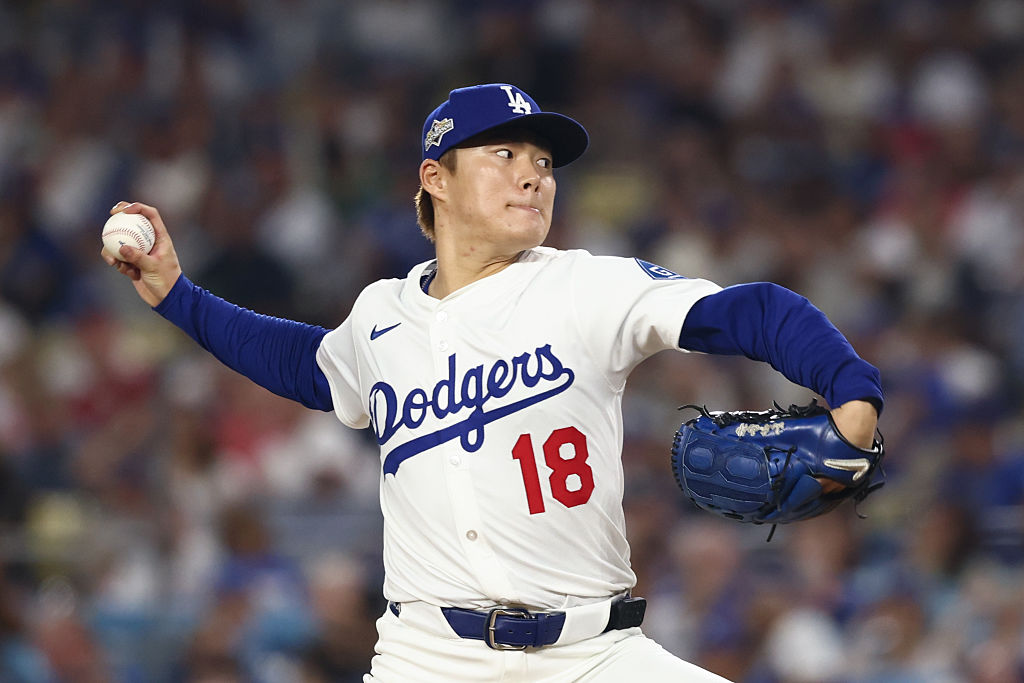 Yoshinobu Yamamoto throws a pitch ahead of Dodgers Blue Jays World Series Game 2