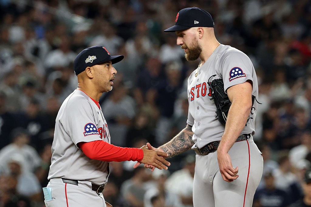 NEW YORK, NEW YORK - SEPTEMBER 30: Garrett Crochet #35 of the Boston Red Sox shakes hands with manager Alex Cora #13 as he is removed from the eighth inning of game one of the American League Wild Card Series against the New York Yankees at Yankee Stadium on September 30, 2025 in the Bronx borough of New York City.  (Photo by Al Bello/Getty Images)