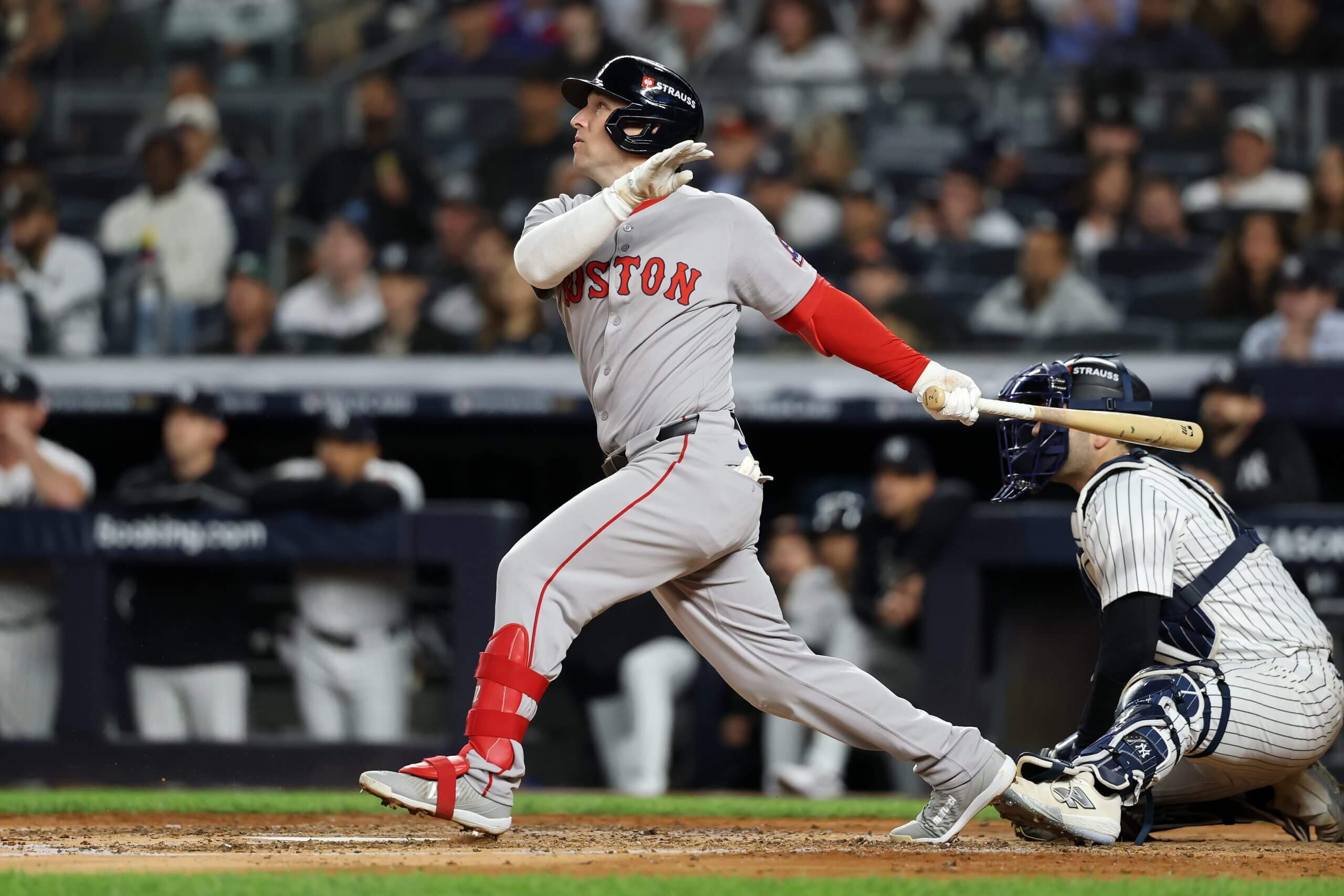Alex Bregman takes a swing for the Boston Red Sox.