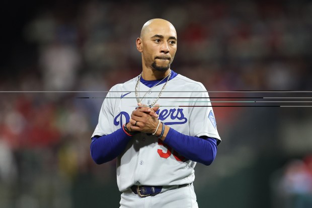 Dodgers star Mookie Betts looks on in the third inning...