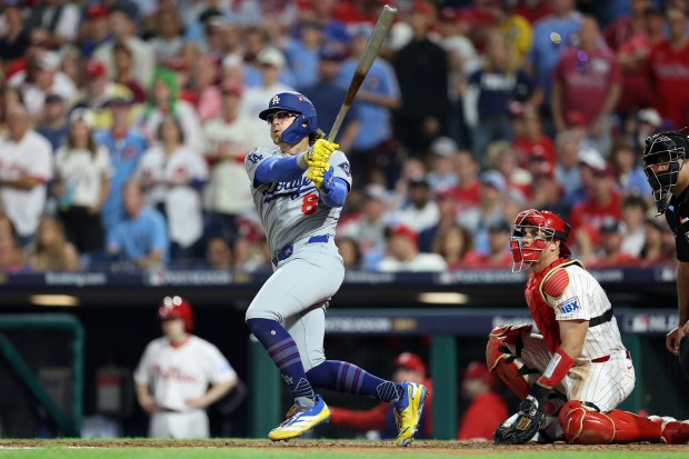 The Dodgers’ Kike Hernande hits a two-run double in the...