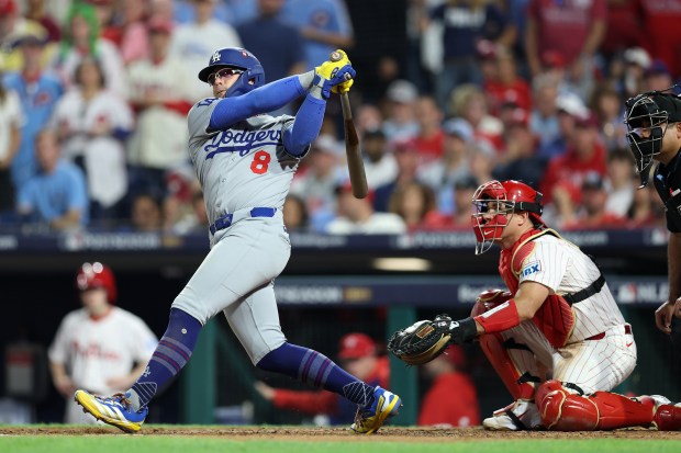 The Dodgers’ Kike Hernande hits a two-run double in the...