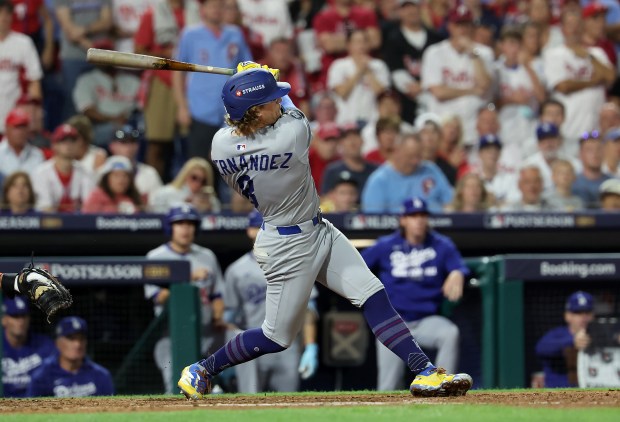 The Dodgers’ Kike Hernande hits a two-run double in the...