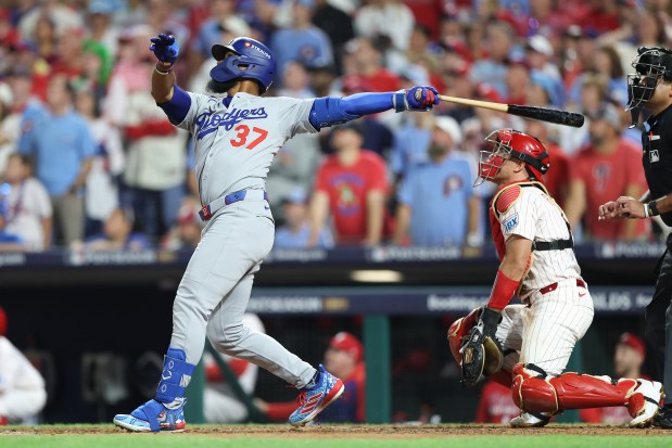 The Dodgers’ Teoscar Hernandez hits a go-ahead three-run home run...