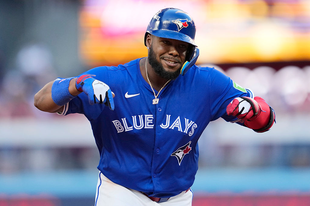 TORONTO, ONTARIO - OCTOBER 05: Vladimir Guerrero Jr. #27 of the Toronto Blue Jays celebrates after a grand slam during the fourth inning in game two of the American League Division Series against the New York Yankees at Rogers Centre on October 05, 2025 in Toronto, Ontario. (Photo by Mark Blinch/Getty Images)