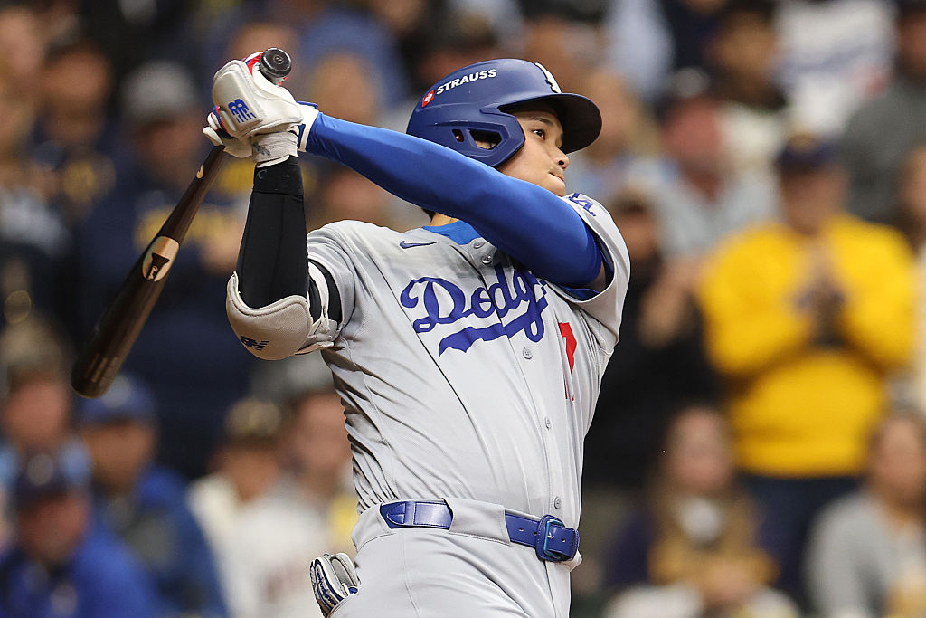 MILWAUKEE, WISCONSIN - OCTOBER 14: Shohei Ohtani #17 of the Los Angeles Dodgers lines out during the second inning against the Milwaukee Brewers in game two of the National League Championship Series at American Family Field on October 14, 2025 in Milwaukee, Wisconsin.