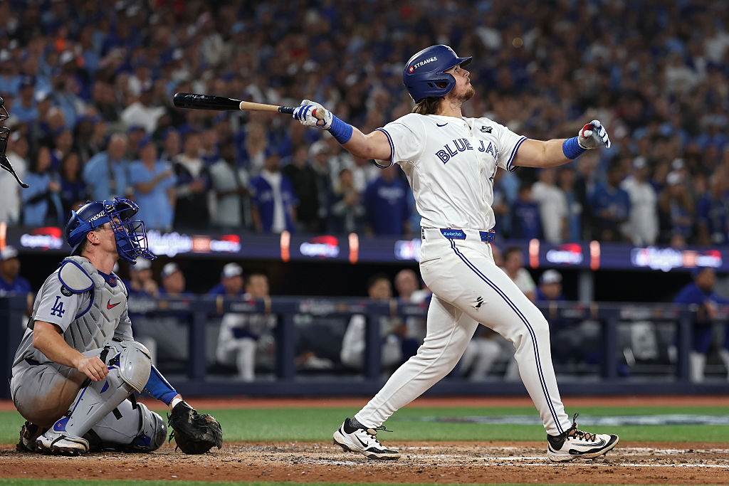 TORONTO, ONTARIO - OCTOBER 24: Addison Barger #47 of the Toronto Blue Jays hits a grand slam home run against the Los Angeles Dodgers during the sixth inning in game one of the 2025 World Series at Rogers Center on October 24, 2025 in Toronto, Ontario. (Photo by Patrick Smith/Getty Images)